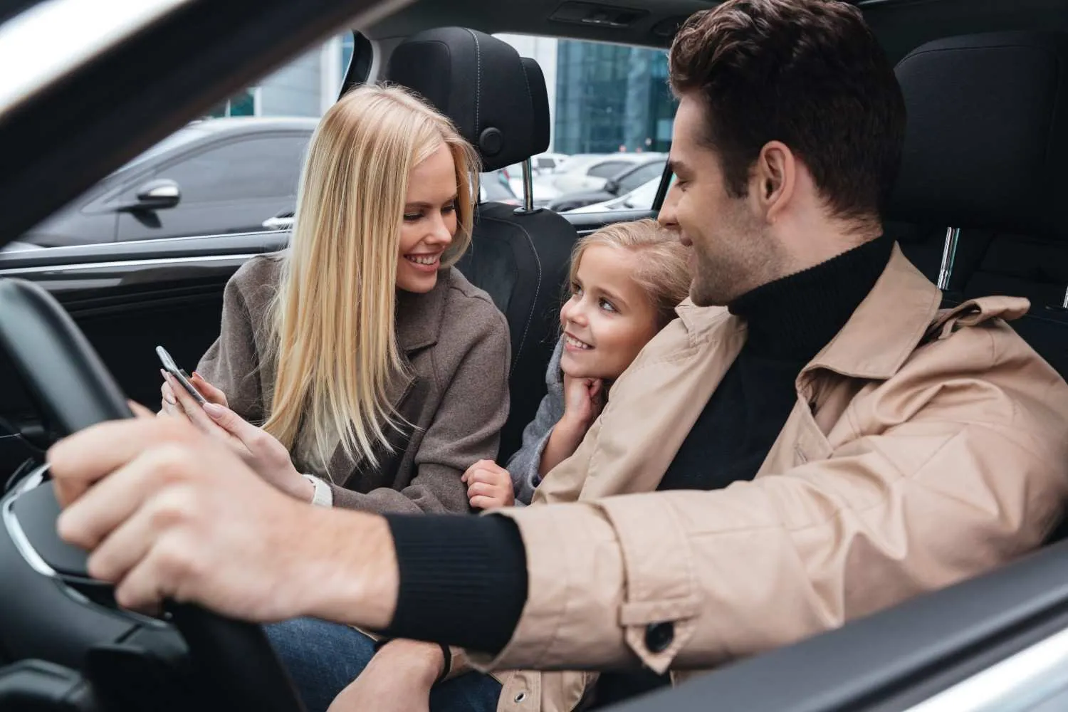 Driver holding car keys after choosing a policy