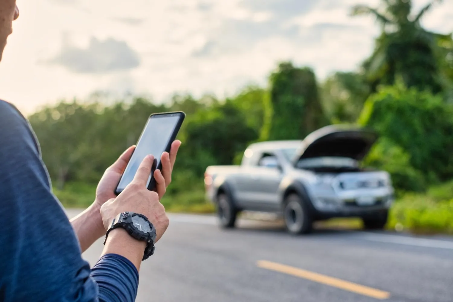 Roadside assistance helping a stopped car
